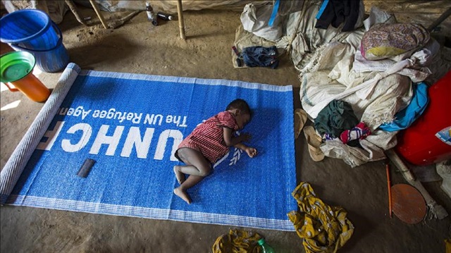 File Photo: A child sleeps on an United Nations High Commissioner for Refugees (UNHFR) mat on the floor at a refugee camp in Cox's Bazar, Bangladesh on December 27, 2017. Rohingya Muslims live in makeshift tents made of bamboo, mud-brick and plastic.