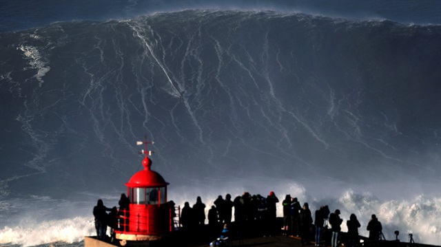 Big wave surfer Sebastian Steudtner of Germany drops in on a large wave at Praia do Norte in Nazare, Portugal, January 18, 2018