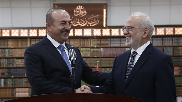 Turkish Foreign Minister Mevlut Cavusoglu (L) and Iraqi Foreign Minister Ibrahim al-Jaafari (R) hold a joint press conference after their meeting in Baghdad, Iraq on January 21, 2018.