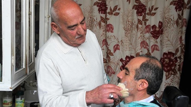 Alaaddin Calisiye has been cutting hair for more than half a century