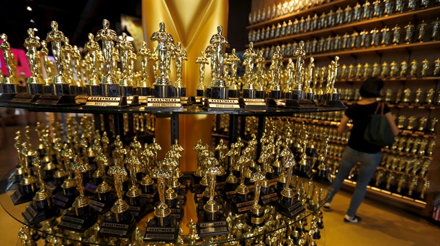 Miniature replica Oscar statuettes are shown for sale
