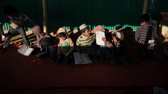 Rohingya refugee children attend an Arabic school to learn to recite the Koran at Jamtoli camp.