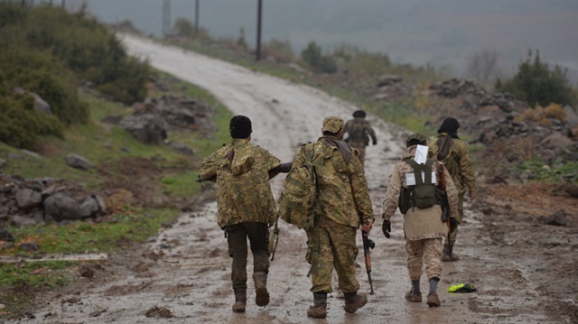 Members of Free Syrian Army (FSA), backed by Turkish Army, are seen as they launch an operation against PYD/PKK in Afrin, as part of the "Operation Olive Branch", on January 23, 2018 in Afrin, Syria.