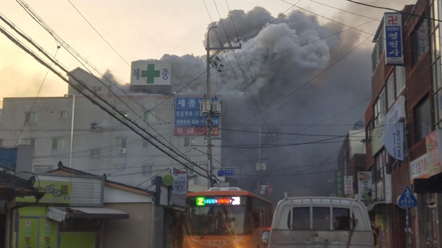 Smoke rises from a burning hospital in Miryang, South Korea, January 26, 2018. Yonhap via REUTERS