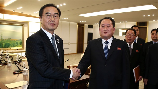 File Photo: Head of the North Korean delegation, Ri Son Gwon shakes hands with South Korean counterpart Cho Myoung-gyon after their meeting at the truce village of Panmunjom