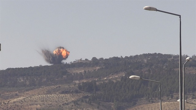 A photo taken from Turkey's Kilis province, on January 28, 2018 shows smokes rising at Burseya Mountain as Turkish military aircrafts and howitzers continue to hit PYD/PKK terror group targets within the 'Operation Olive Branch' launched in Syria's Afrin.