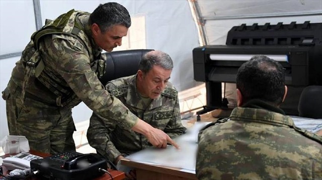 Turkish army chief Gen. Hulusi Akar is seen while checking plans for Operation Olive Branch at border troops in Hatay, Sanliurfa and Kilis province near Syrian border on January 27, 2018