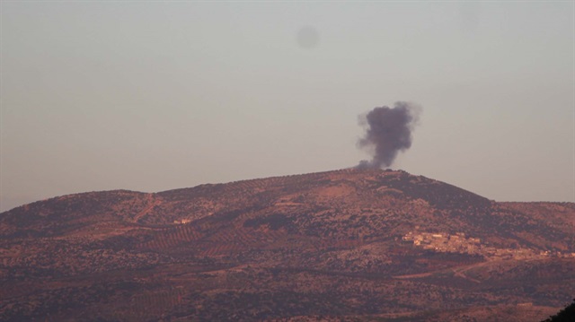  photo taken from Turkey's Hatay province, on January 28, 2018 shows smoke rising as Turkish military aircrafts and howitzers continue to hit PYD/PKK terror group targets within the 'Operation Olive Branch' launched in Syria's Afrin.