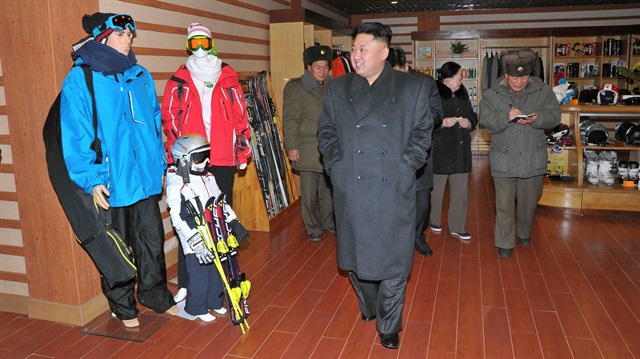 FILE PHOTO: North Korean leader Kim Jong Un (front) visits the Masik-Ryong Ski Resort, 