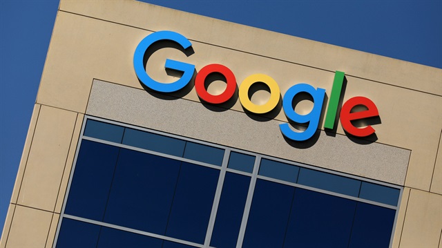FILE PHOTO: The Google logo is pictured atop an office building in Irvine, California, U.S.