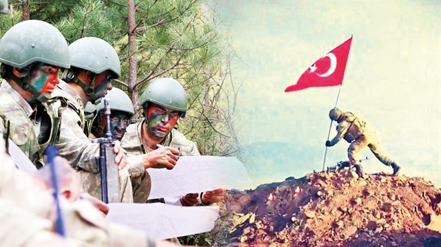Komandolar, “Türk milletine armağandır” diyerek dağa bayrak dikti.