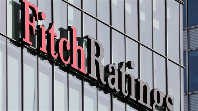 FILE PHOTO: The Fitch Ratings logo is seen at their offices at Canary Wharf financial district