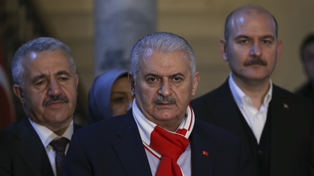 Prime Minister of Turkey, Binali Yildirim (C) gives a speech during his visit to Governorate of Kilis on February 04, 2018 in Kilis, Turkey. Turkish Interior Minister Suleyman Soylu and Turkish Minister of Transport, Maritime and Communication Ahmet Arslan accompanied the Prime Minister during his visit.