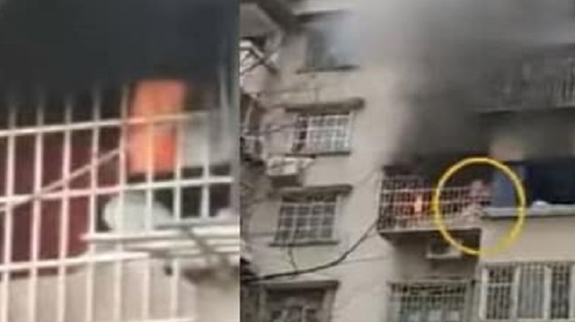 بالفيديو.. فتاة تتسلق بناية هربًا من حريق التهم شقتها
