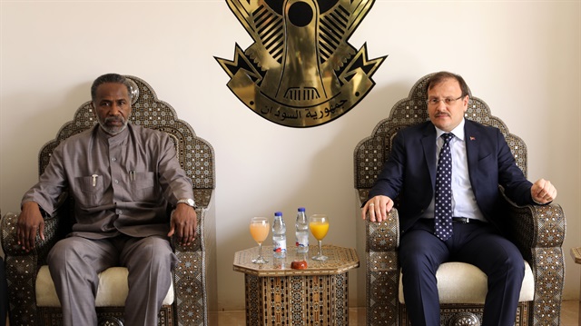 Turkish Deputy Prime Minister Hakan Cavusoglu (R) is welcomed by Sudan's Tourism Minister, Abu Zaid Mustafa (L) at Khartoum International Airport during his official visit in Khartoum, Sudan on February 20, 2018.