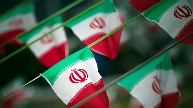 File Photo: Iran's national flags are seen on a square in Tehran