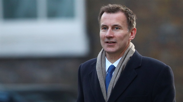 Britain's Secretary of State for Health and Social Care Jeremy Hunt arrives in Downing Street in London