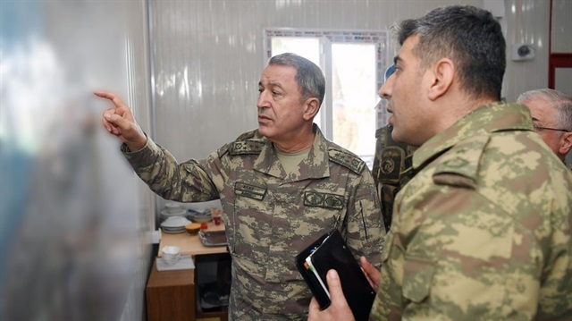 Gen. Hulusi Akar (L)