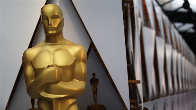 An Oscar statue is seen outside the Dolby Theatre during preparations for the Oscars in Hollywood, Los Angeles