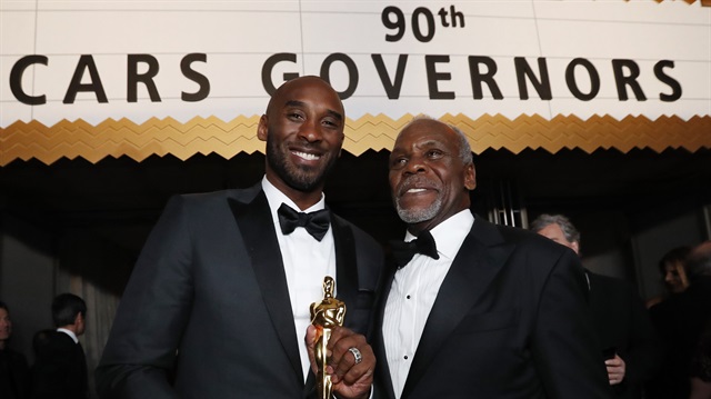 90th Academy Awards - Oscars Governors Ball - Hollywood, California, U.S., 04/03/2018 – Kobe Bryant, holding Oscar for Best Animated Short Film Award for "Dear Basketball," and Danny Glover