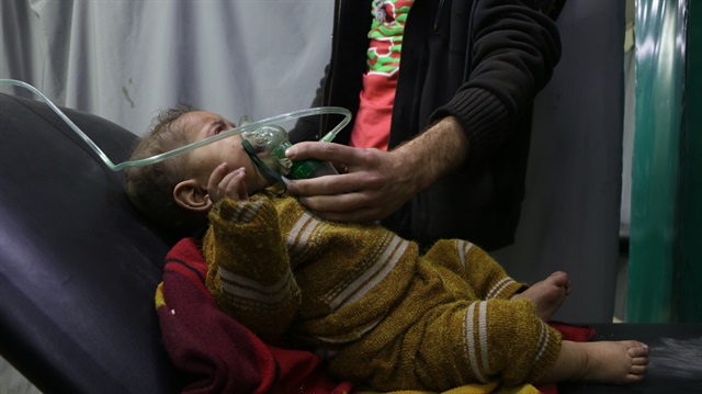 A Syrian baby receives medical treatment at the field hospital after Assad Regime's chlorine gas attack in Hamouriyah district of Eastern Ghouta in Damascus, Syria on March 6, 2018.