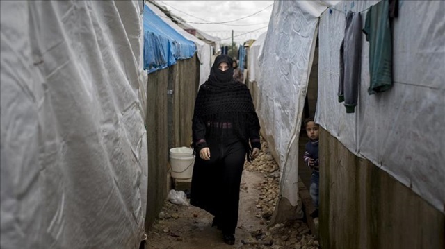 Amira is seen at the Haramein refugee camp, where hosts thousands of war victims fled from their homeland due to ongoing civil war in Azaz, Syria.