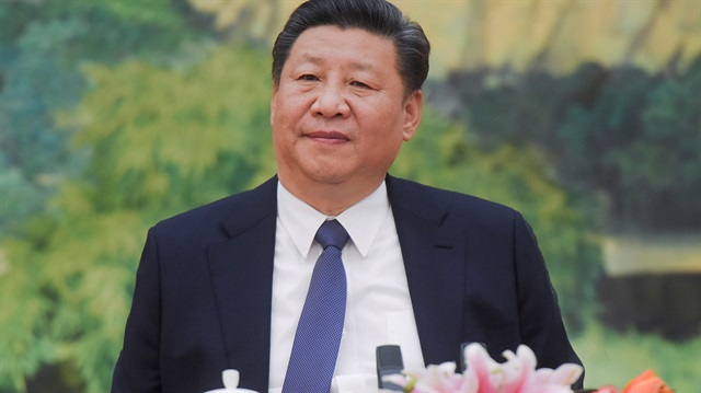 Chinese President Xi Jinping attends a meeting at the Great Hall of The People in Beijing