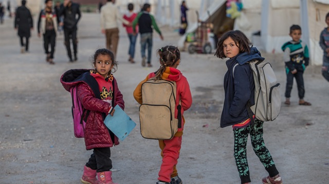 Syrian refugee children's lives at a tent city in Turkey