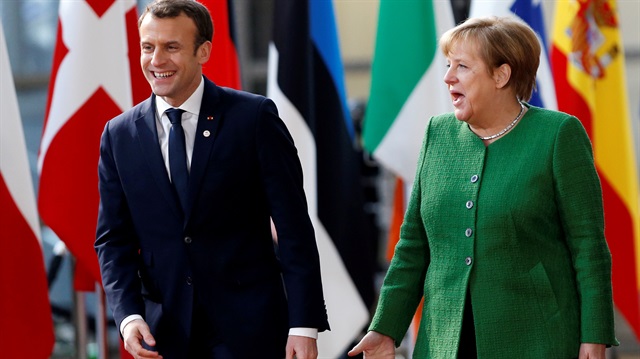 French President Emmanuel Macron and Germany's Chancellor Angela Merkel.