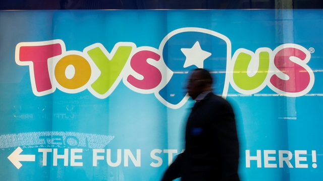 File Photo: A man passes by Toys R Us store at Times Square in New York, U.S., March 9, 2018.