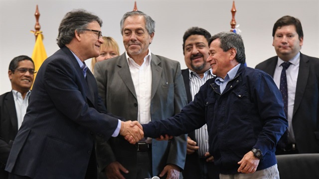 Talks between the Colombian government and the country’s last remaining major rebel group resumed Thursday in Ecuador
