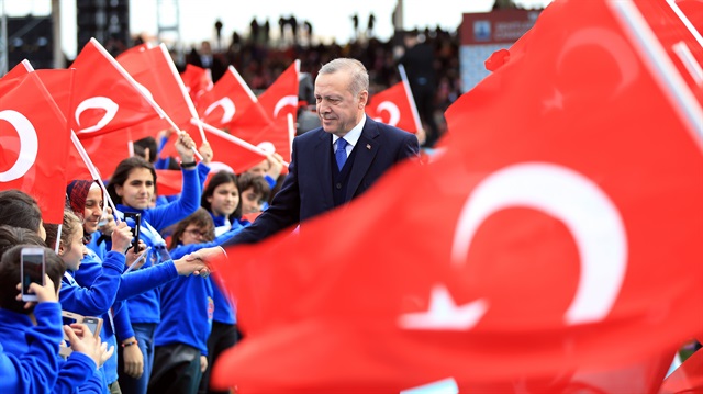 Turkish President Recep Tayyip Erdoğan greets the crowd during the ceremony marking the 103rd anniversary of the Canakkale Land Battles in Canakkale, Turkey on March 18, 2018.