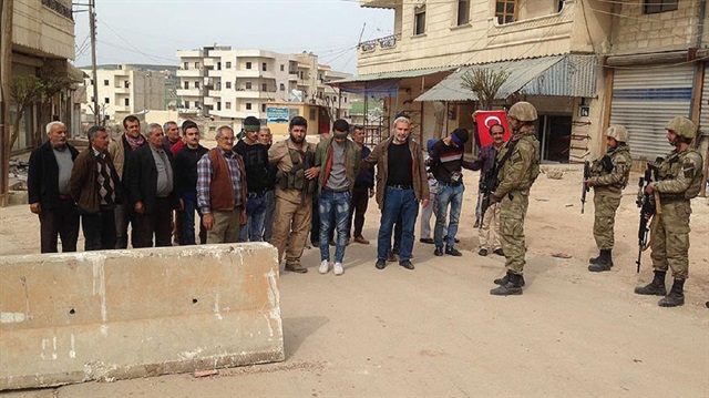 Residents of Afrin on Monday handed over three PKK/KCK/PYD-YPG terrorists to Turkish troops