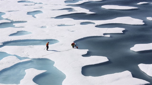 The crew of the U.S. Coast Guard Cutter Healy, in the midst of their ICESCAPE 
