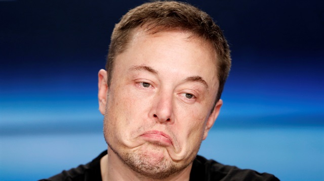 SpaceX founder Elon Musk pauses at a press conference