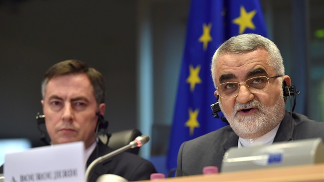 Iranian Alaeddin Boroujerdi, head of parliament's National Security and Foreign Policy Committee (R)