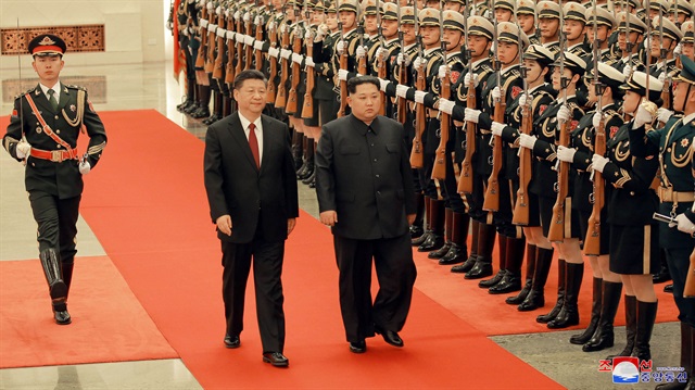 Kuzey Kore lideri Kim Jong un ve Çin Devlet Başkanı Xi Jinping 
