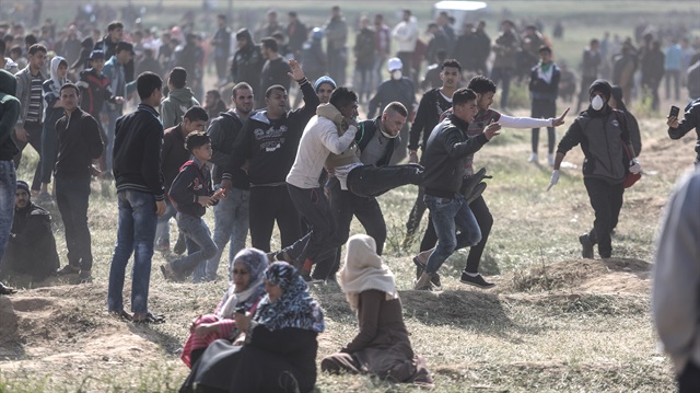 İşgalci İsrail askerlerinin Filistinlilerin 'Büyük Dönüş Yürüyüşü'ne saldırısı sonrası şehit ve yaralılar var.