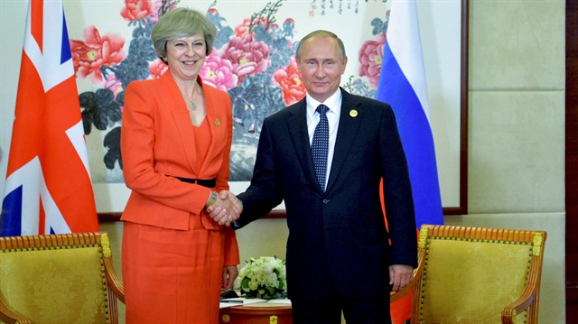 Russian President Vladimir Putin meets with British Prime Minister Theresa May