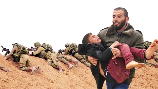 İişgalci İsrail askerleri Gazze sınırına akın eden binlerce Filistinliye ateş etti