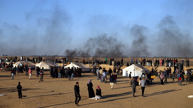 Palestinians gather at a tent city protest along the Israel-Gaza border, demanding the right to return to their homeland, in the southern Gaza Strip April 1, 2018. 