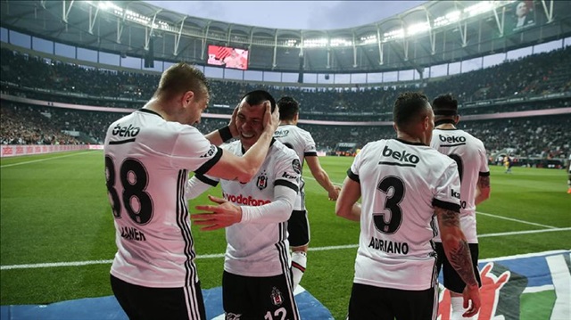 Medel of Besiktas celebrates with team mates after scoring a goal during Turkish Super Lig soccer match between Besiktas and Goztepe at Vodafone Park in Istanbul, Turkey on April 07, 2018. 