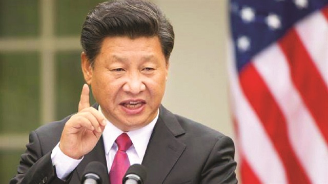 Xi, gümrük duvarlarını yükselten ABD'ye de uyarıda bulundu. 