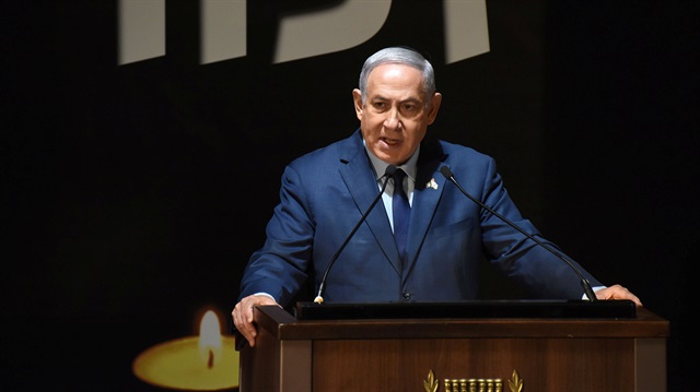 Israeli Prime Minister Benjamin Netanyahu speaks during a Memorial Day ceremony at Mount Herzl military cemetery in Jerusalem, April 18, 2018.