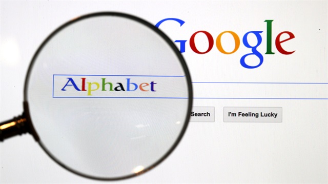 File Photo: A Google search page is seen through a magnifying glass in this photo illustration taken in Berlin, August 11, 2015. 