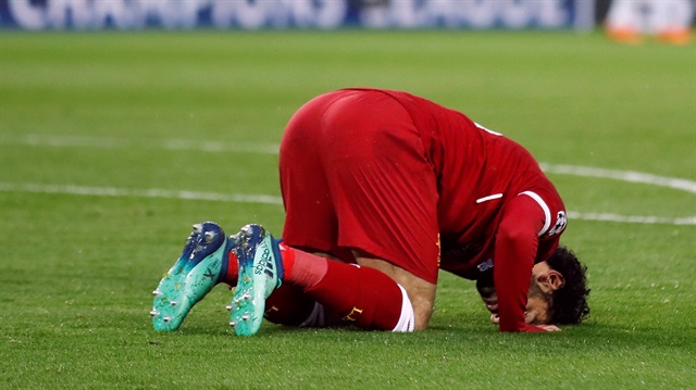 Soccer Football - Champions League Semi Final First Leg - Liverpool vs AS Roma - Anfield, Liverpool, Britain - April 24, 2018 Liverpool's Mohamed Salah celebrates scoring their second goal.