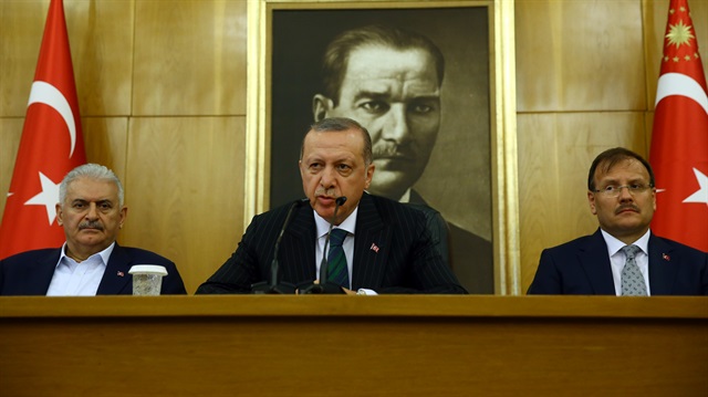 Turkish President Recep Tayyip Erdoğan (C)