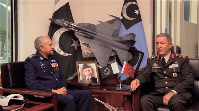 Turkish Chief of General Staff Hulusi Akar (R) meets with officials as he visits Pakistani Air Forces Command in Islamabad, Pakistan on May 04, 2018.