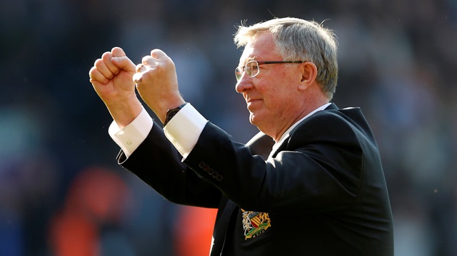 File Photo: Manchester United manager Alex Ferguson salutes the fans after their English Premier League soccer match against West Bromwich Albion at The Hawthorns in West Bromwich