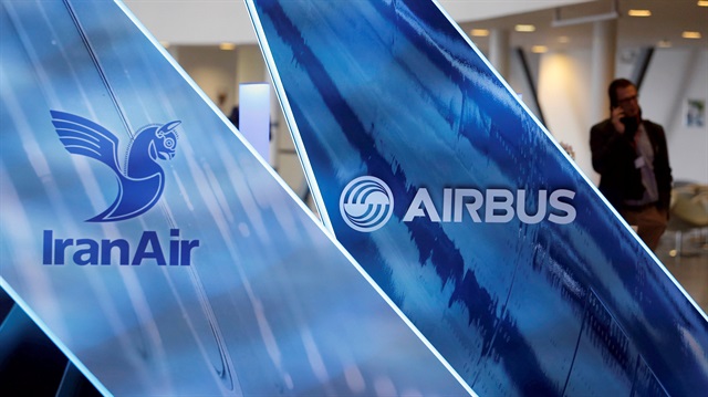 File Photo: The logos of Airbus group and IranAir are pictured the company IranAir takes delivery of the first new Western jet under an international sanctions deal in Colomiers